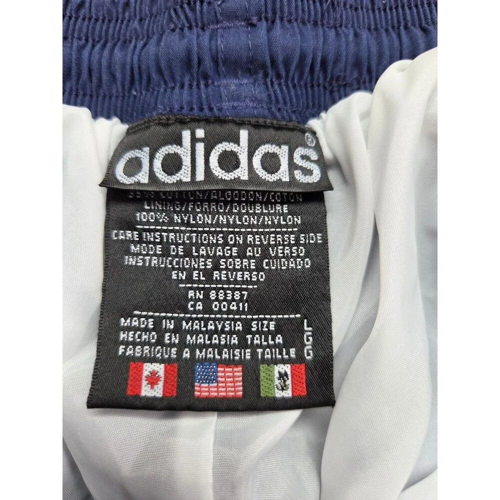 vintage adidas track pants blue size large